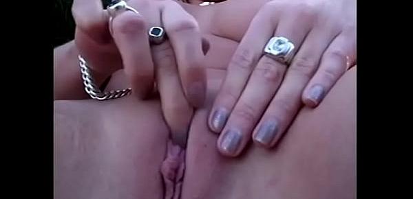  Horny blonde with nice tits finger fucks her succulent pussy then dildos it park